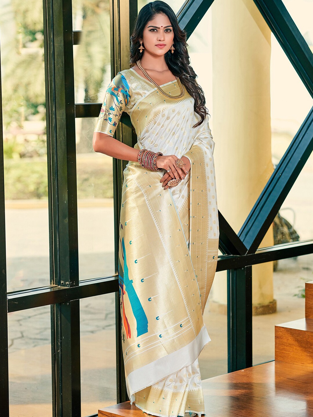 

Satrani White & Blue Ethnic Motif Woven Design Zari Paithani Saree