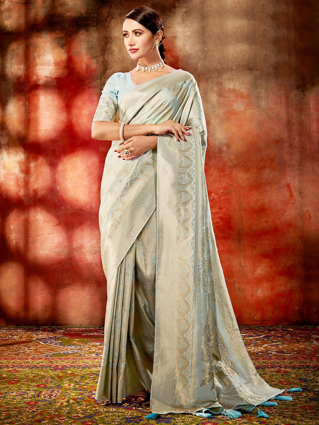 

Satrani Blue & Gold-Toned Floral Woven Design Zari Kanjeevaram Saree
