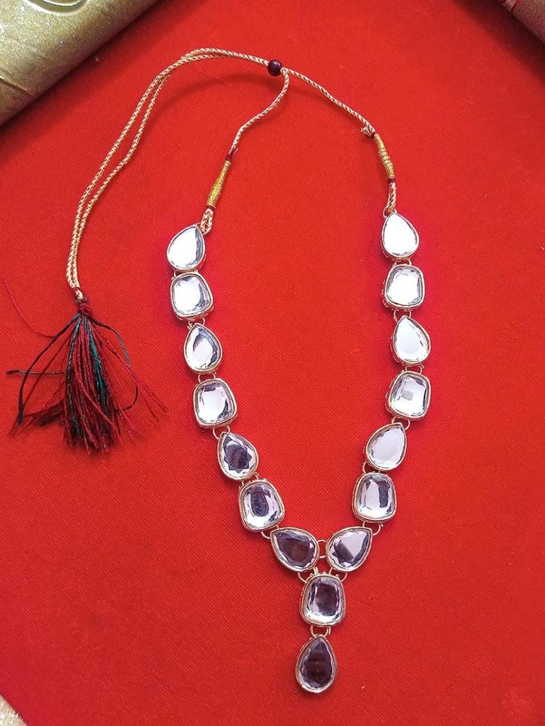 

Samridhi DC Silver-Plated Kundan-Studded Jewellery Set