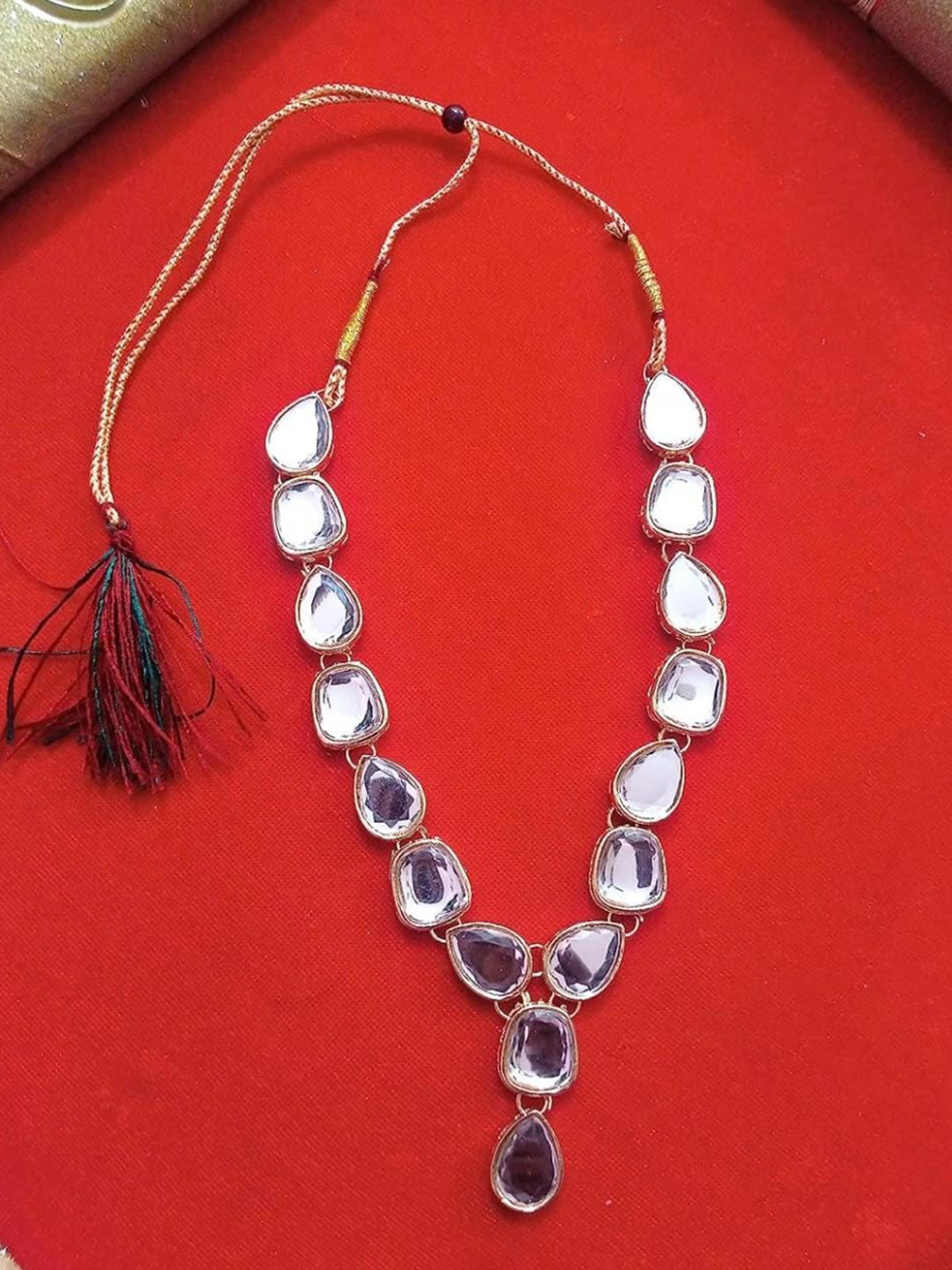 

Samridhi DC Silver-Plated Kundan-Studded Jewellery Set