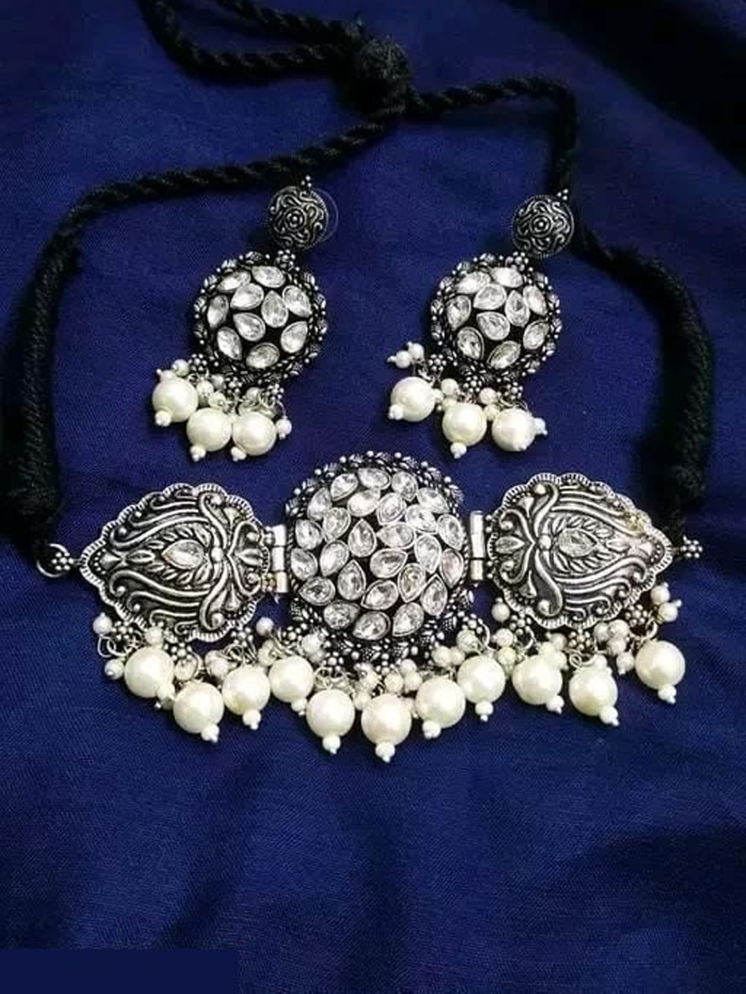 

Samridhi DC Silver-Plated Stone-Studded & Beaded Choker Jewellery Set