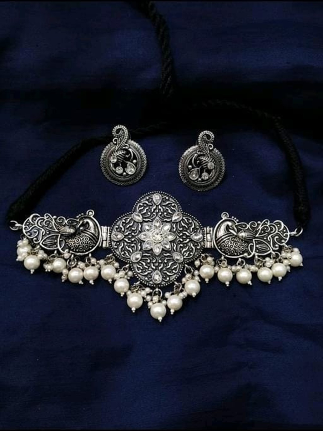 

Samridhi DC Silver-Plated Stone-Studded & Beaded Oxidised Jewellery Set