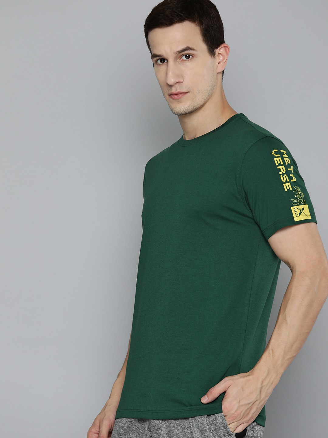 

HRX by Hrithik Roshan Men Solid T-shirt, Green