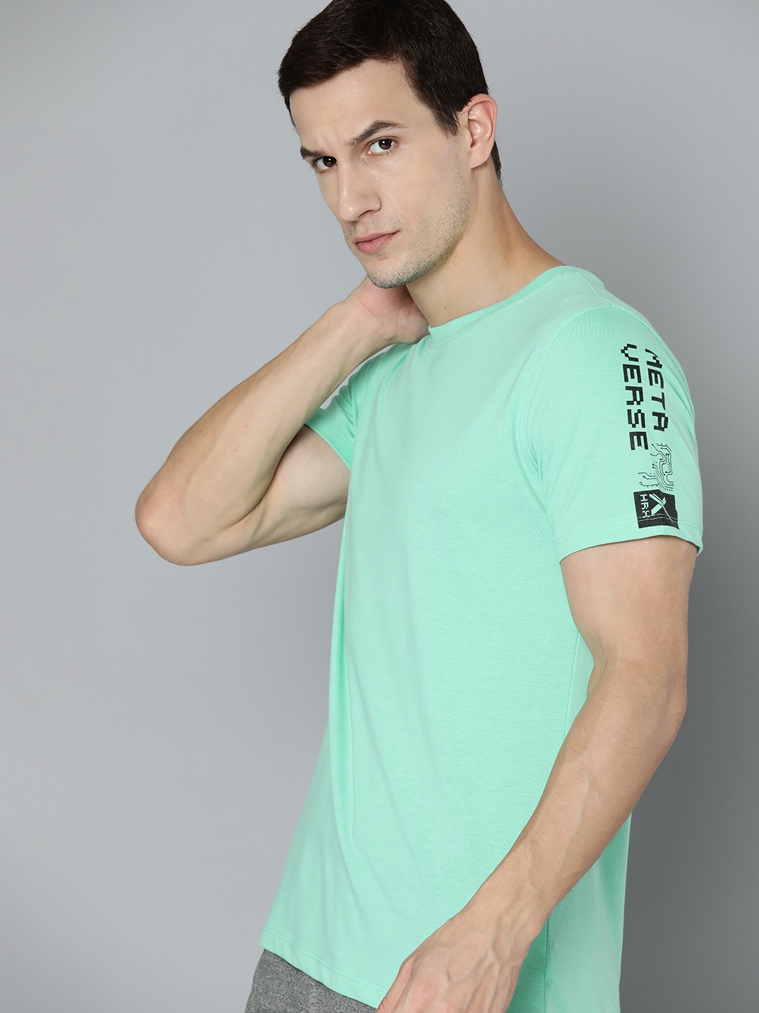 

HRX by Hrithik Roshan Men Solid T-shirt, Green