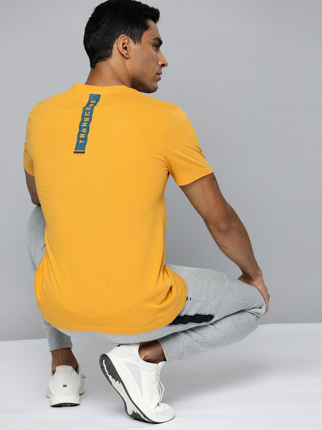 

HRX by Hrithik Roshan Men Typography Printed T-shirt, Mustard