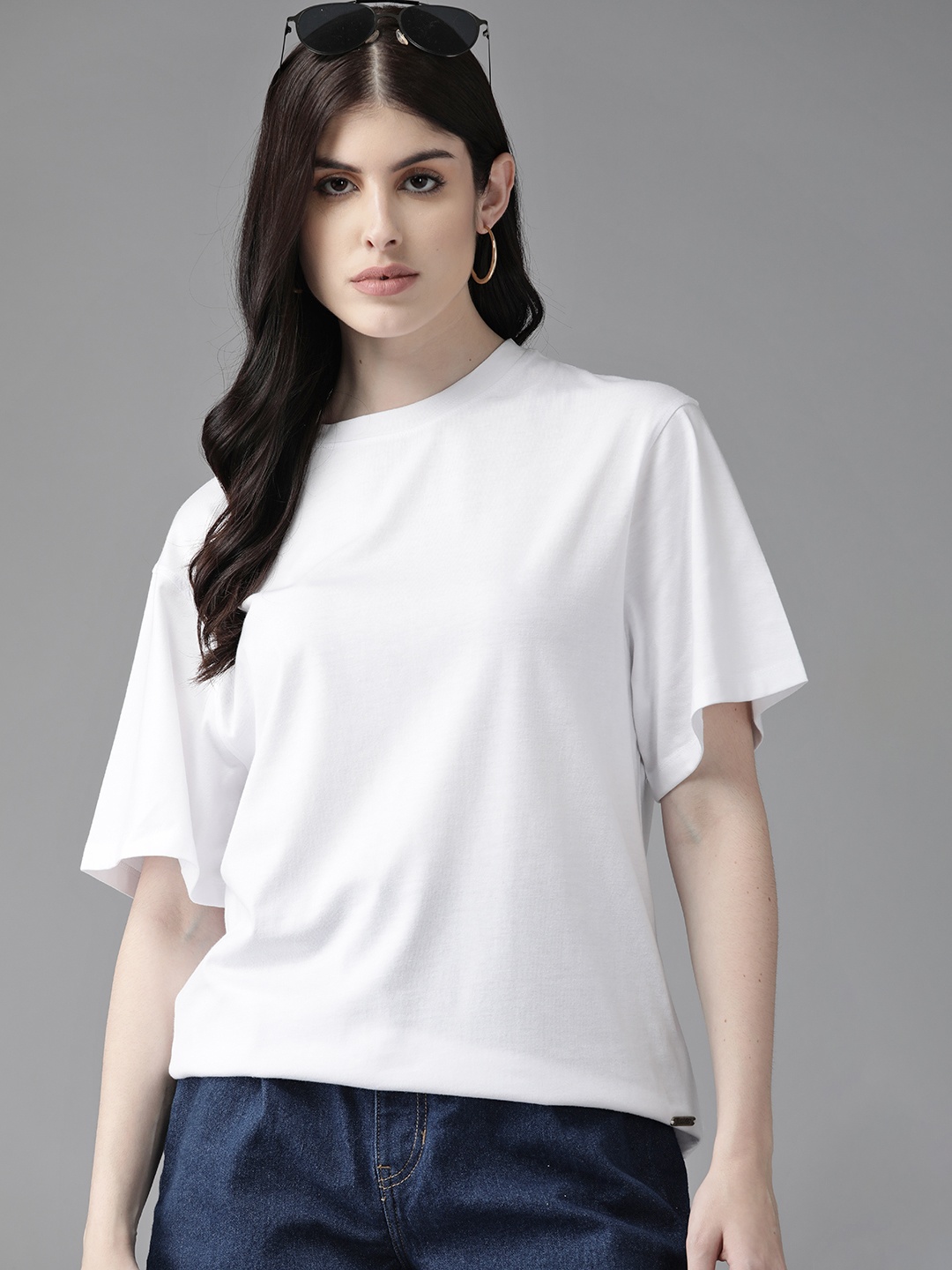 

The Roadster Lifestyle Co. Women Solid Boxy Fit Drop-Shoulder Sleeves Pure Cotton T-shirt, White