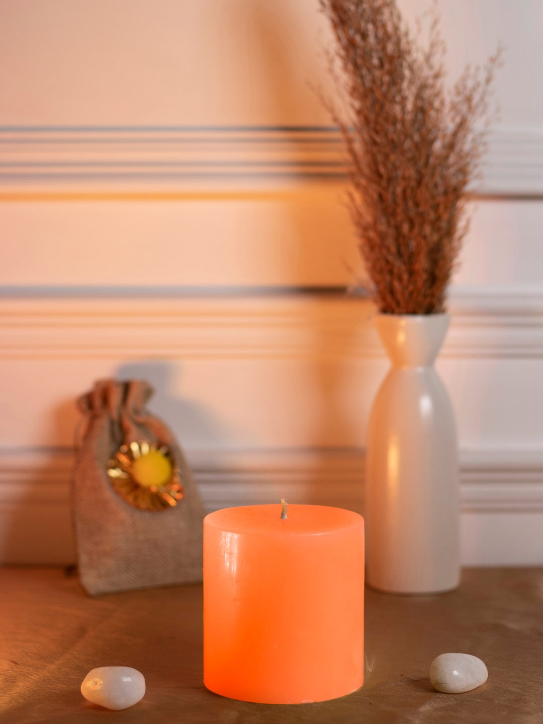 

Dhrohar Oriental Elegance Orange-Colored Blossom Scented Pillar Candle