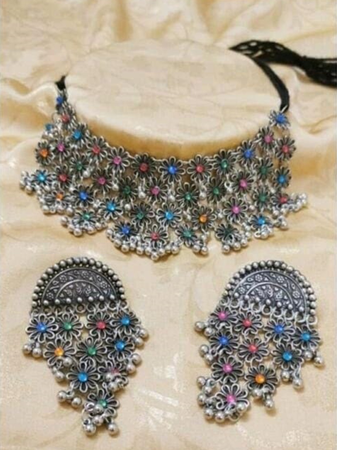 

Samridhi DC Oxidised Silver-Plated Stone-Studded & Beaded Necklace & Earrings