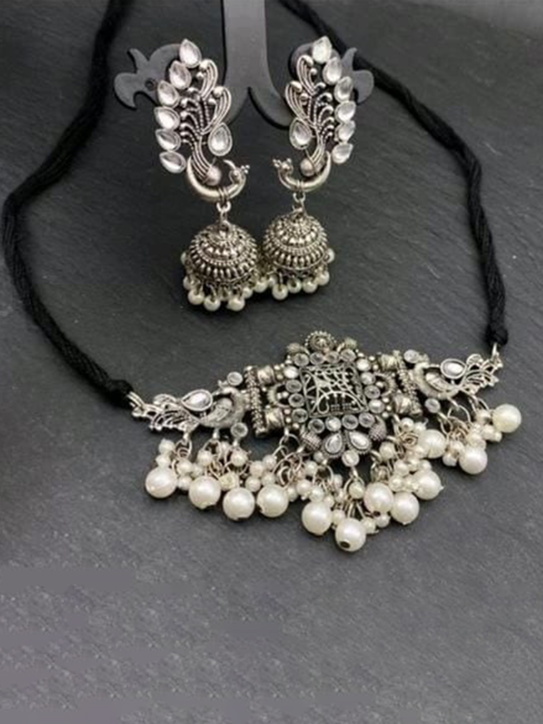 

Samridhi DC Silver-Plated Oxidised Stone-Studded & Beaded Afghan Jewellery Set