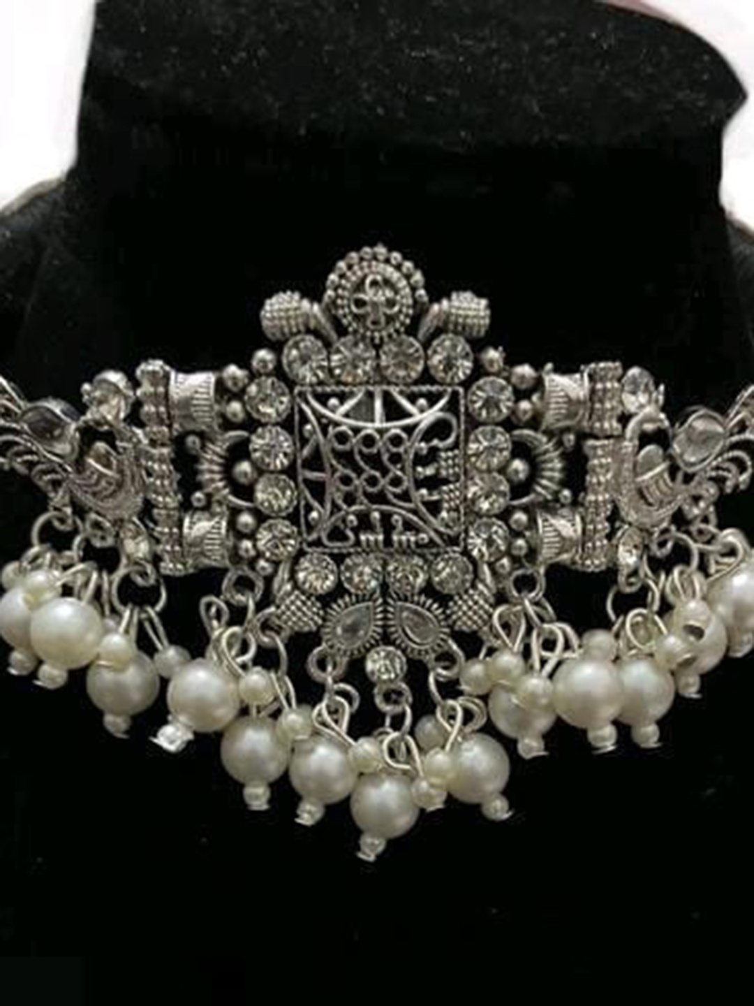 

Samridhi DC Silver-Plated Stone-Studded & Beaded Oxidised Afghan Jewellery Set