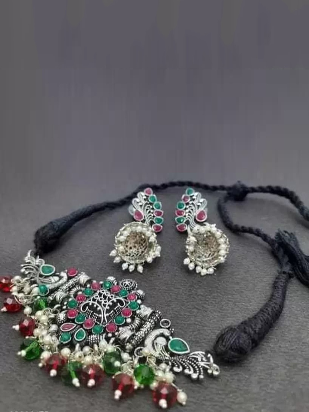 

Samridhi DC Silver-Plated Stone-Studded & Beaded Oxidised Jewellery Set