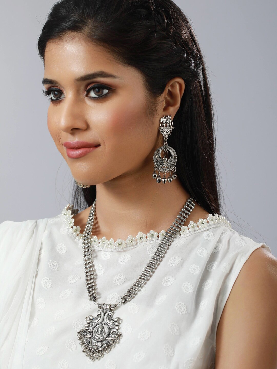 

Sangria Silver-Toned Silver-Plated Stone Studded & Beaded Peacock Jewellery Set