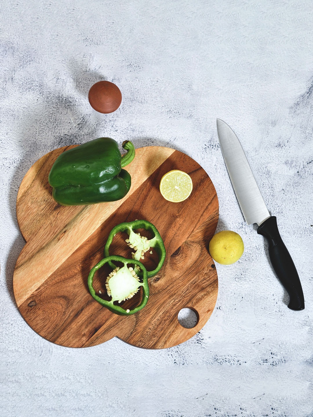 

JAIPUR FASHION MODE Brown Fouround-Shaped Wooden Chopping Board