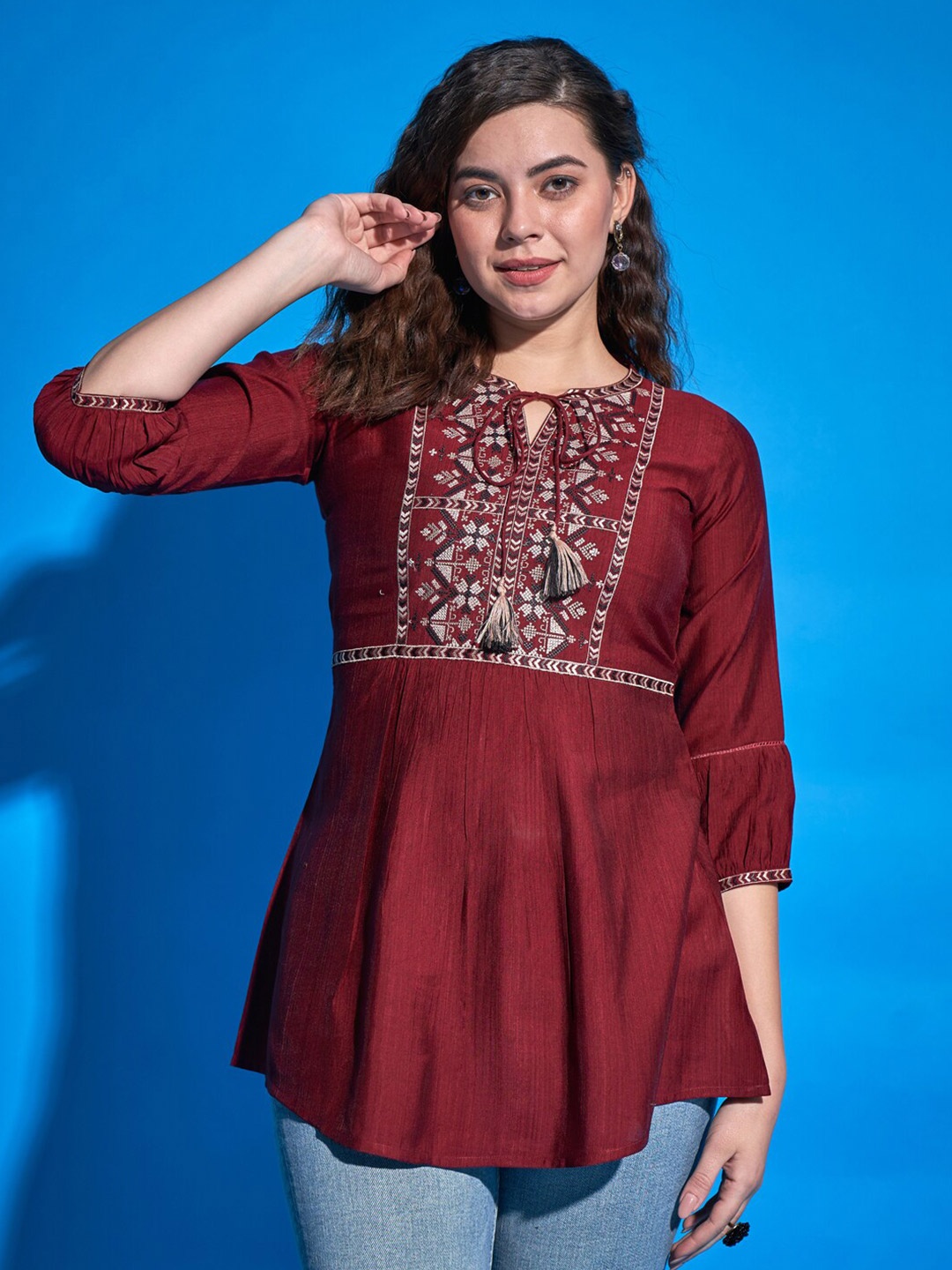 

Sangria Geometric Embroidered Tie-Up Neck Longline A-line Top, Maroon