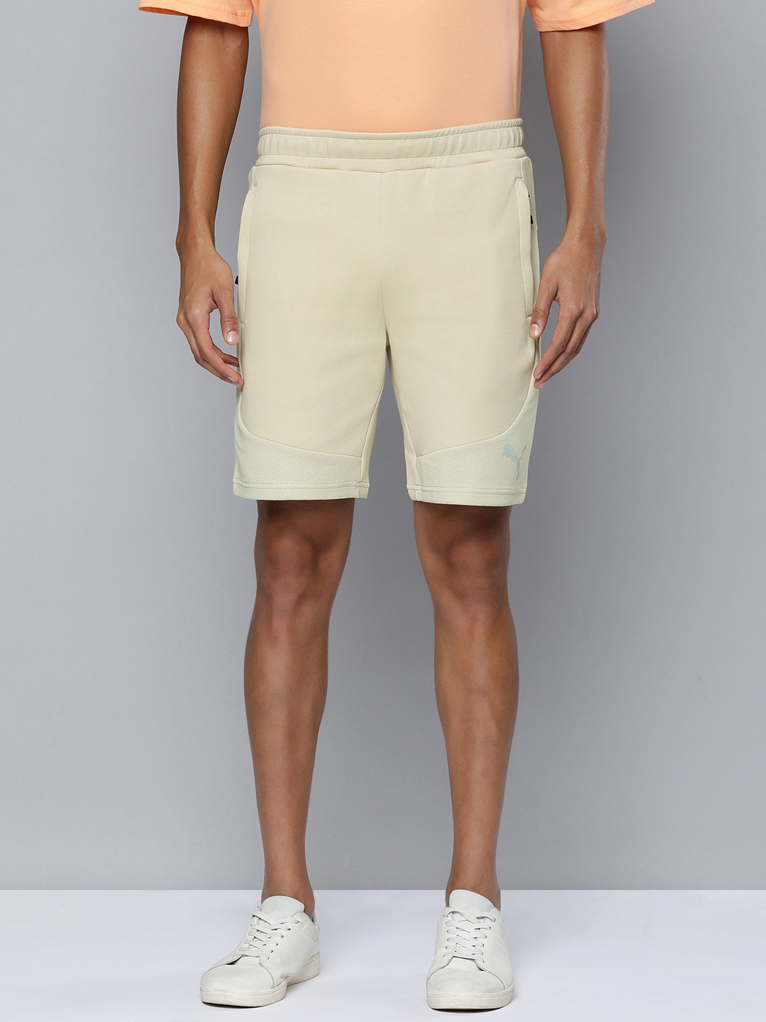 

Puma Men EVOSTRIPE Mid-Rise Dry Cell Sports Shorts, Beige