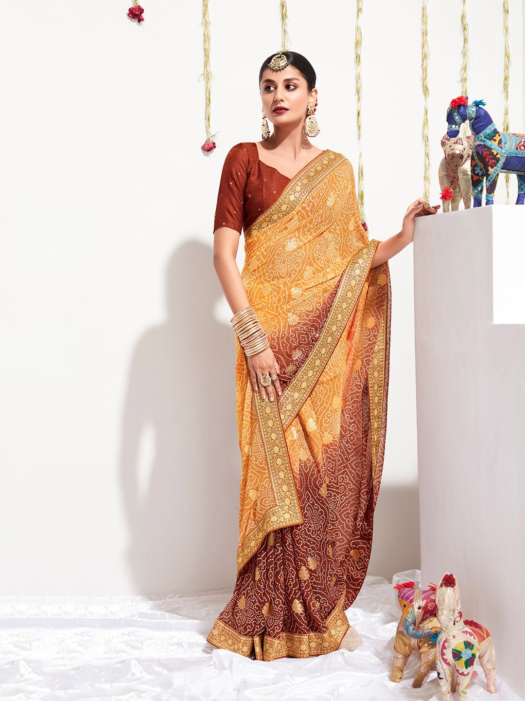 

all about you Beige & Brown Bandhani printed Zari Pure Georgette Saree