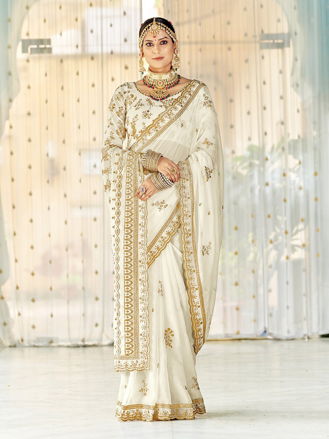 

Fusionic White Ethnic Motifs Embroidered Organza Saree