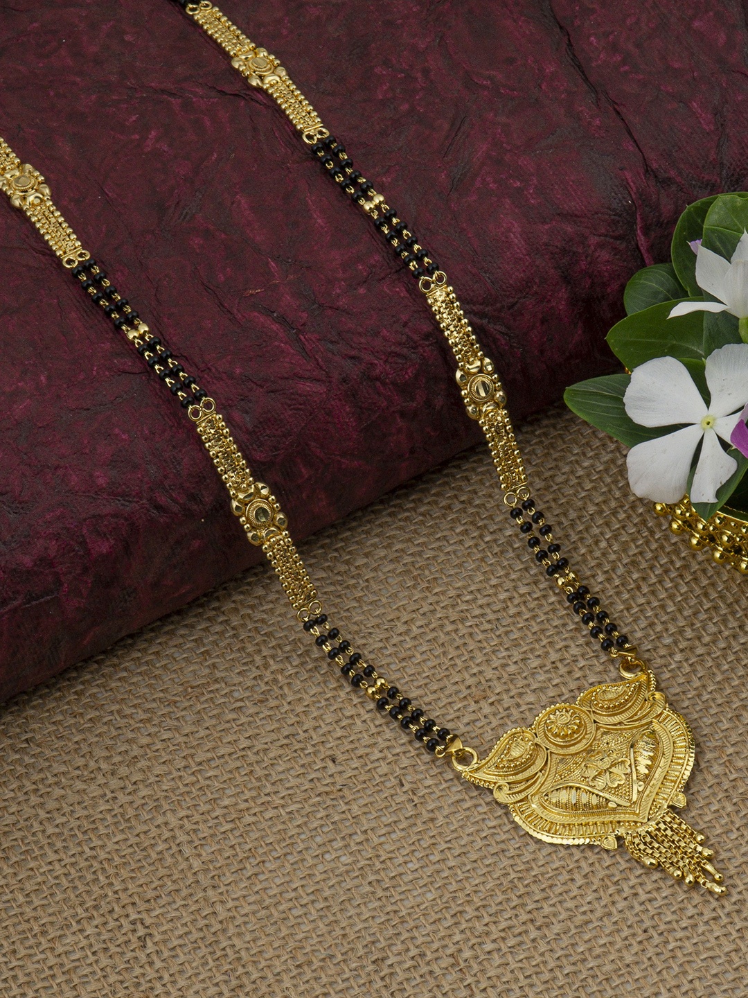 

Ramdev Art Fashion Jwellery Gold-Plated & Black Beaded Mangalsutra