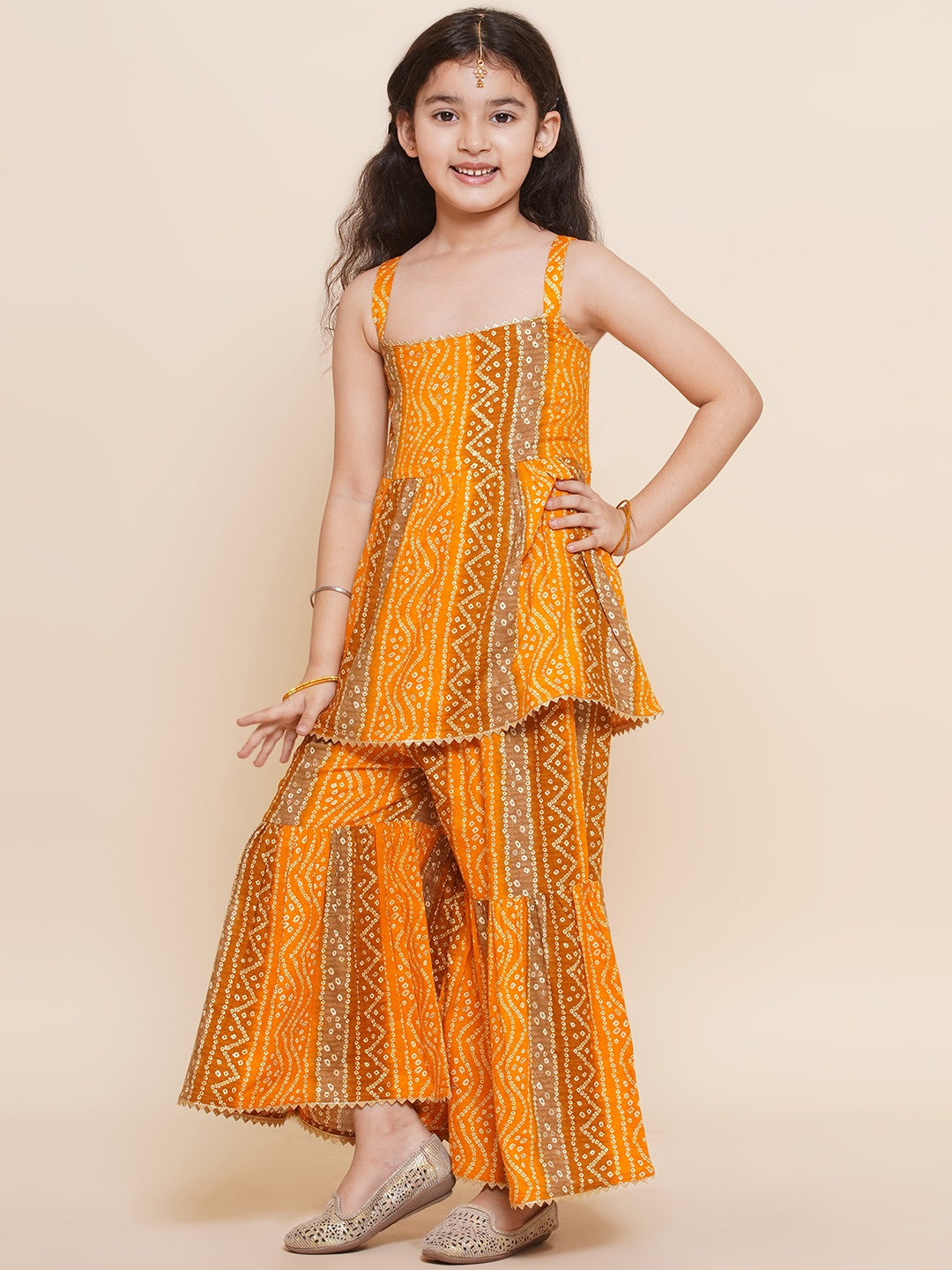 

Aj DEZInES Girls Bandhani Printed Gotta Patti Pure Cotton Kurti with Sharara, Mustard
