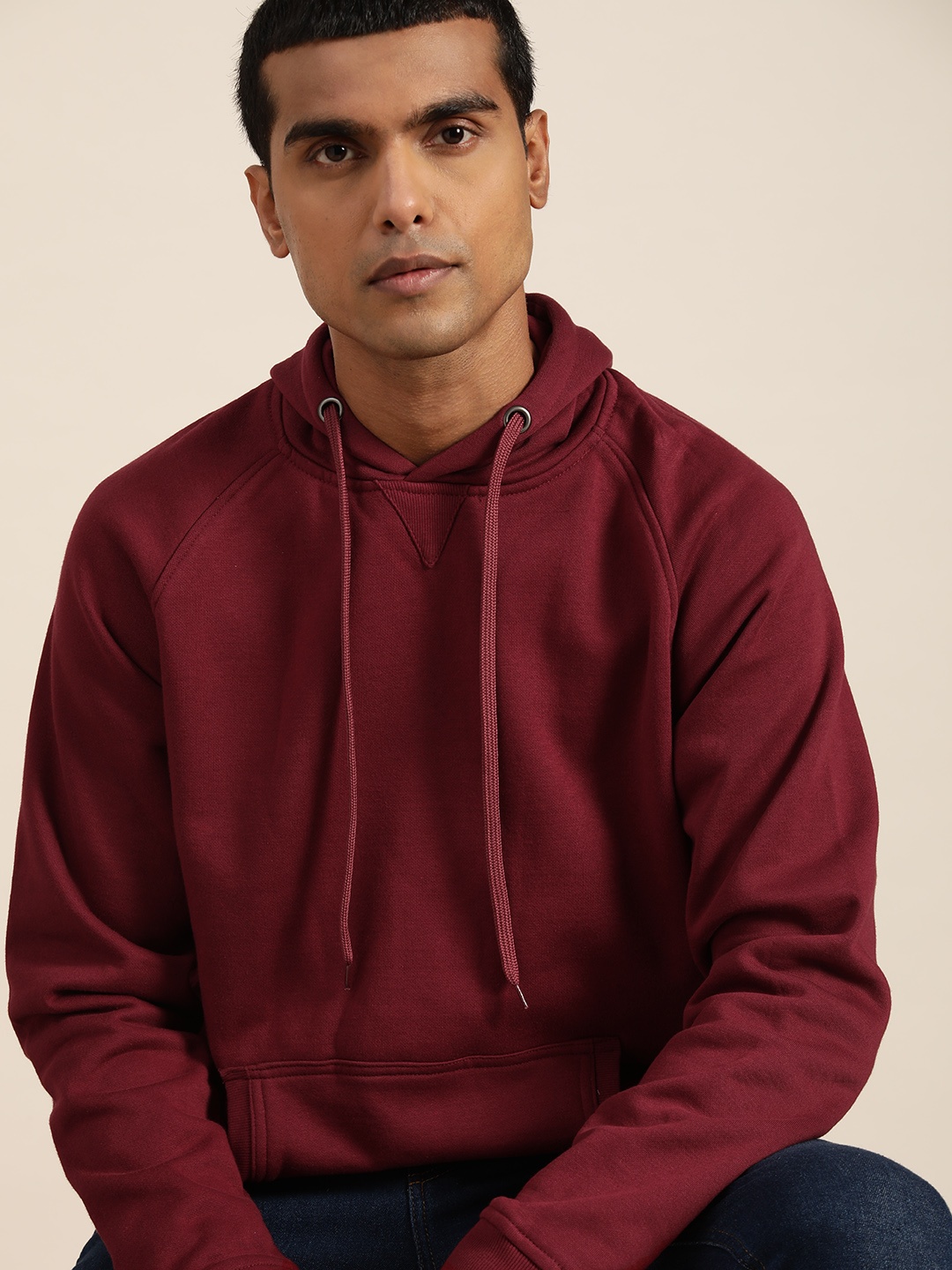 

ether Men Maroon Solid Hooded Sweatshirt