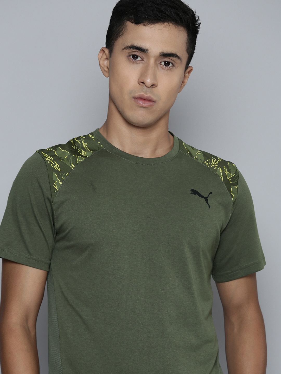 

Puma TRAIN CONCEPT AOP Dry Cell Round Neck Training T-shirt, Olive