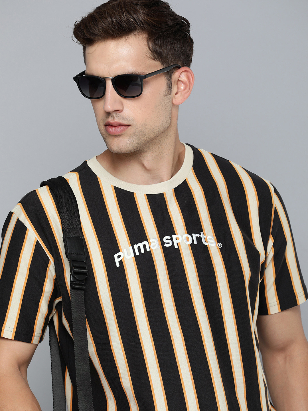 

Puma TEAM Striped Drop-Shoulder Sleeves Relaxed Fit Pure Cotton T-shirt, Black