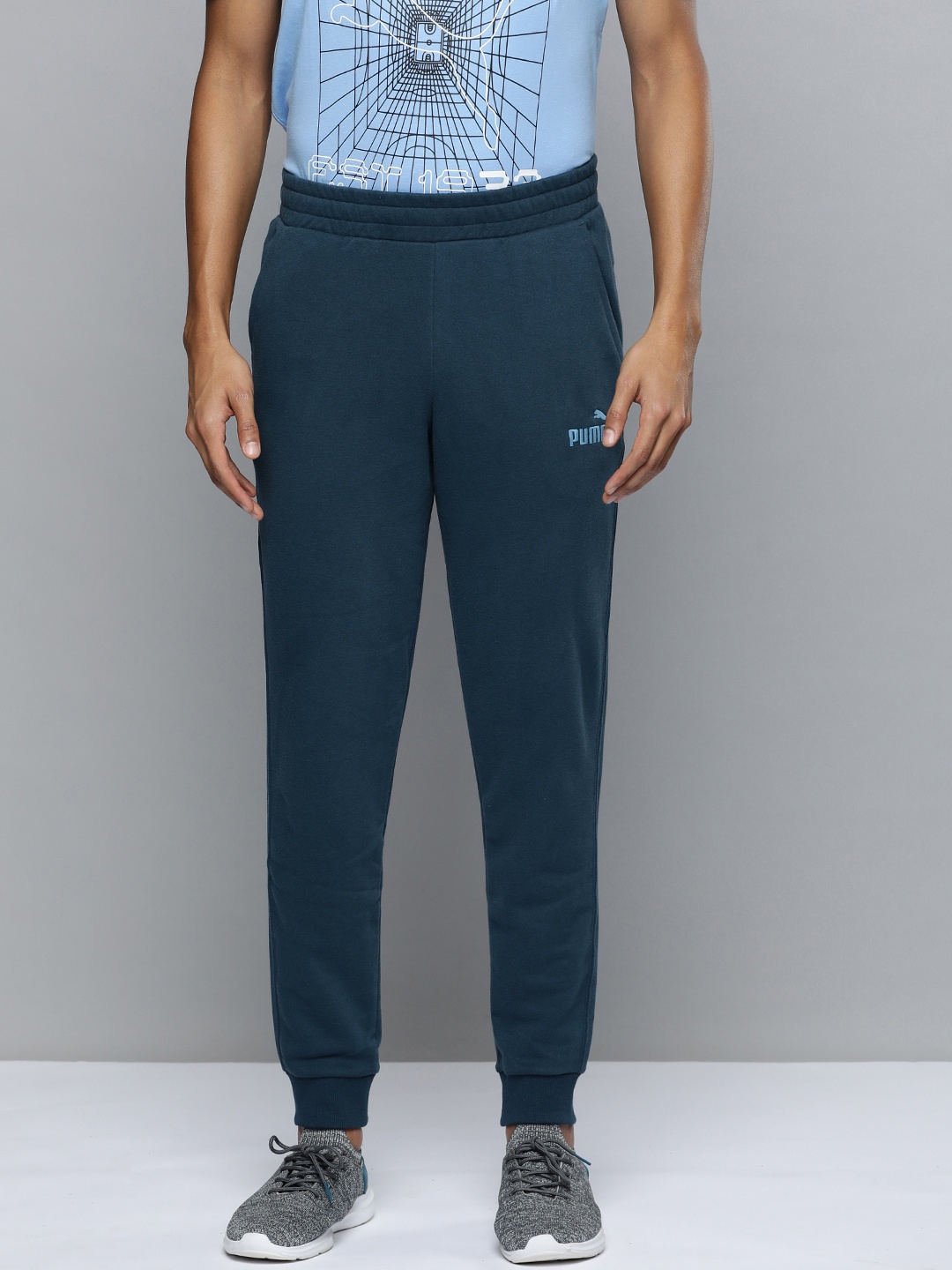

Puma Men Essential ELEVATED Solid Regular fit Mid-Rise Joggers, Navy blue
