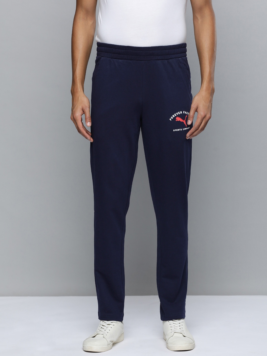 

one8 x PUMA Men Virat Kohli PUMA Logo Printed Slim Fit Track Pants, Navy blue