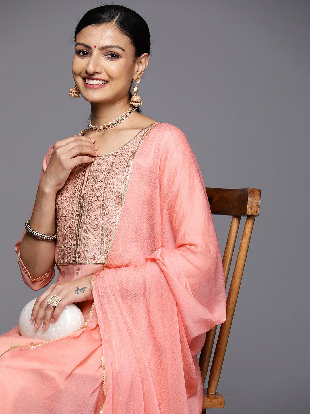 

Libas Ethnic Motifs Yoke Design Sequinned Kurta With Trousers & Dupatta, Peach