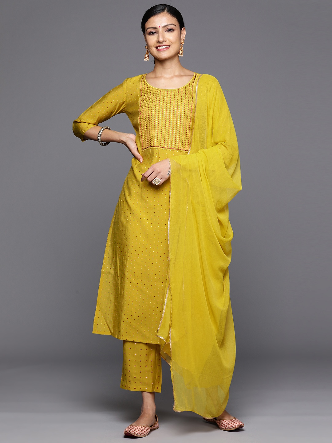 

Libas Yoke Design Panelled Thread Work Kurta With Trousers & Dupatta, Yellow