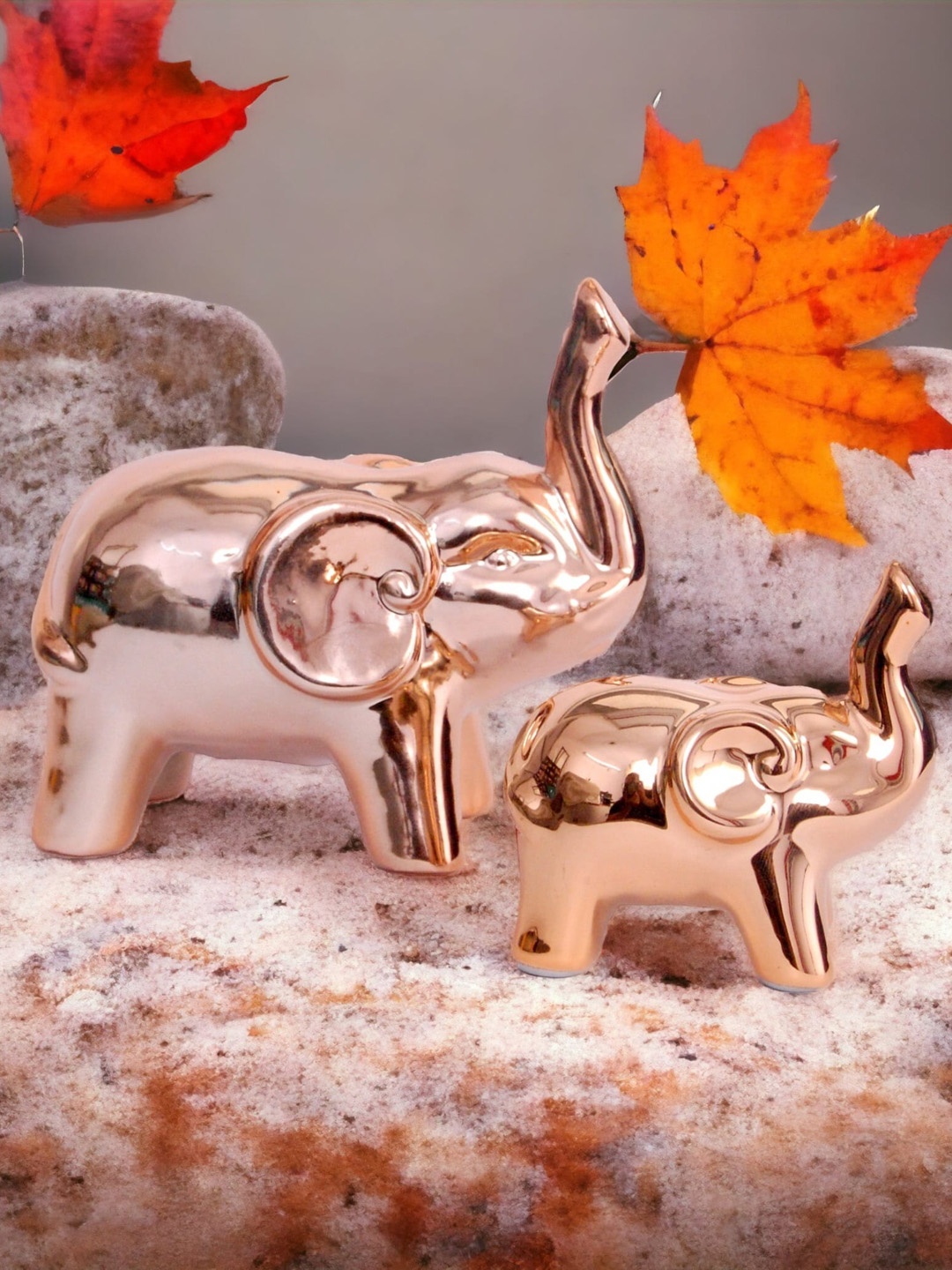 

CHOCOZONE Rose Gold Toned 2 Pieces Ceramic Mother & Baby Elephant Showpieces