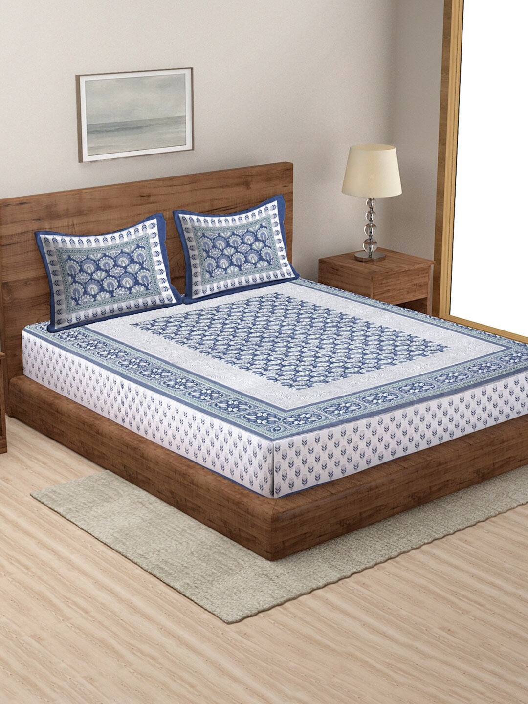 

Rajasthan Decor White & Blue Ethnic Motifs 144 TC Cotton Queen Bedsheet & 2 Pillow Covers