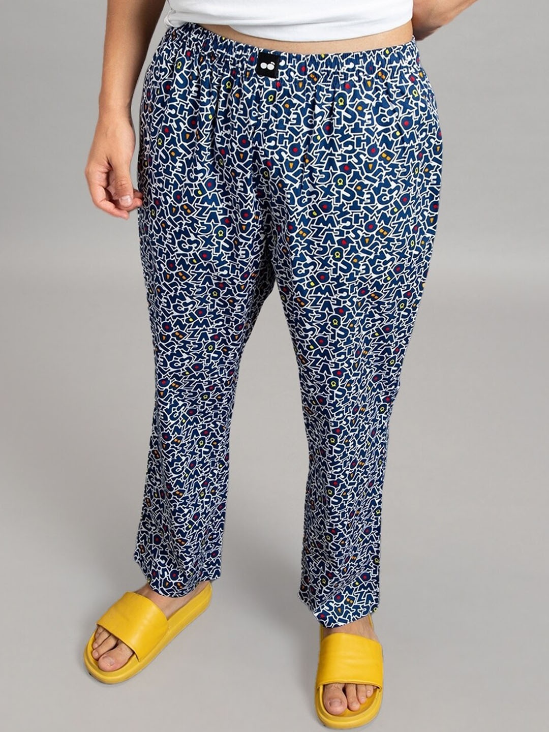 

Bewakoof Men All Over Alphabets Printed Lounge Pants, Blue