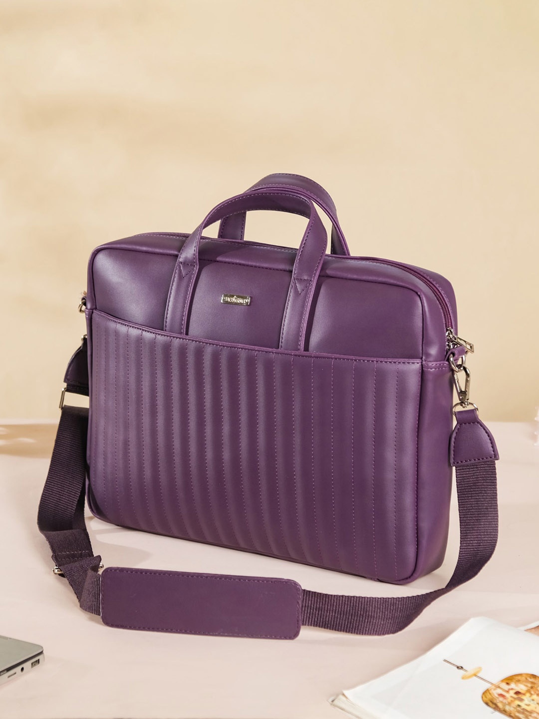 

Nestasia Padded Textured Laptop Bag, Purple