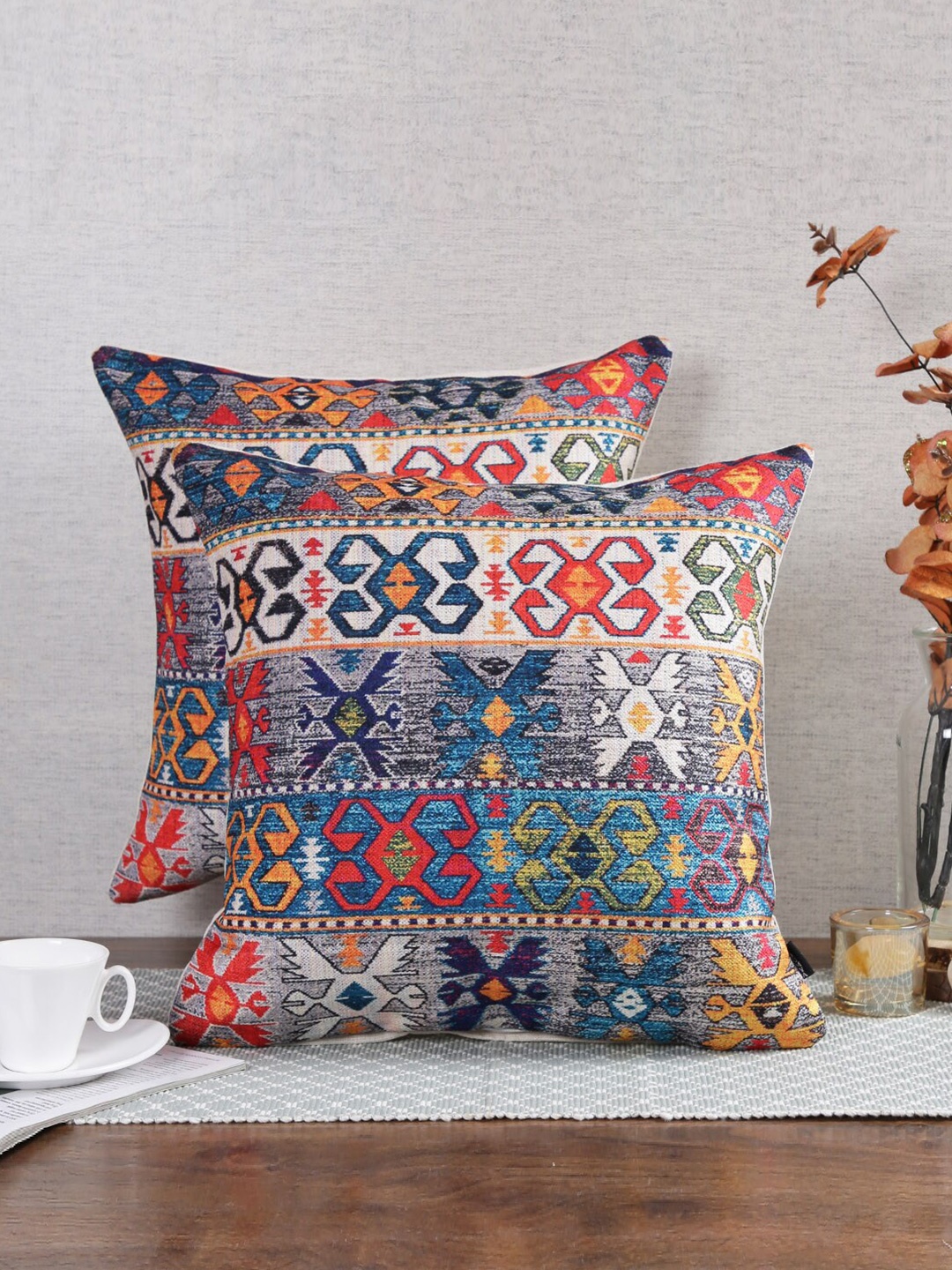 

Soumya Navy Blue & White 2 Pieces Ethnic Motifs Square Cushion Covers