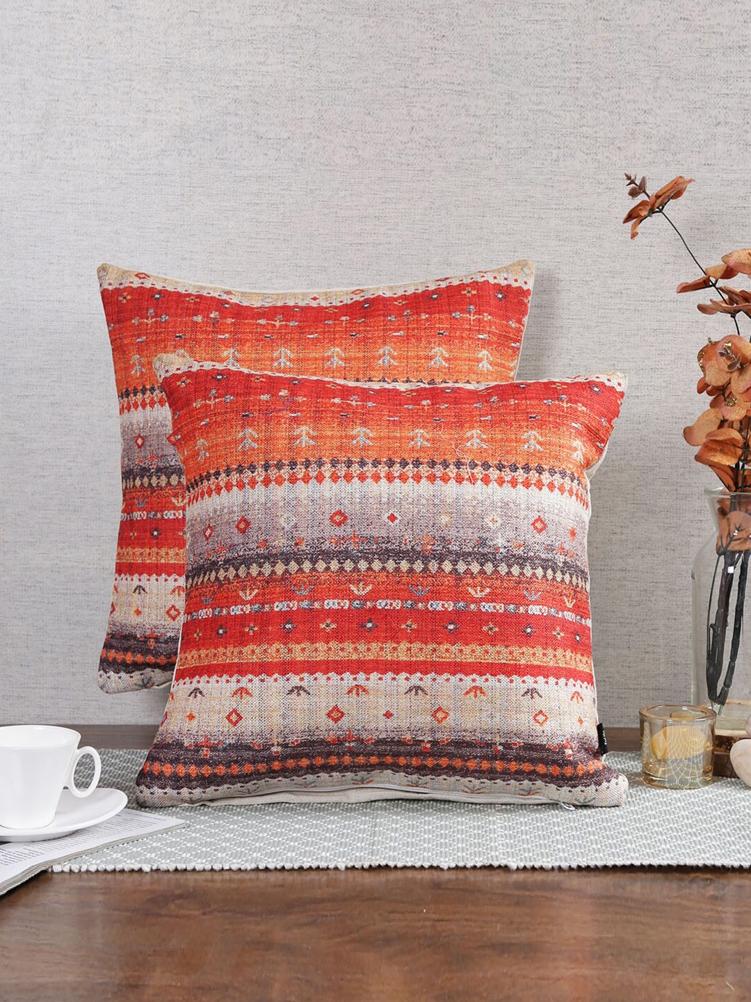 

Soumya Orange & White 2 Pieces Ethnic Motifs Square Cushion Covers