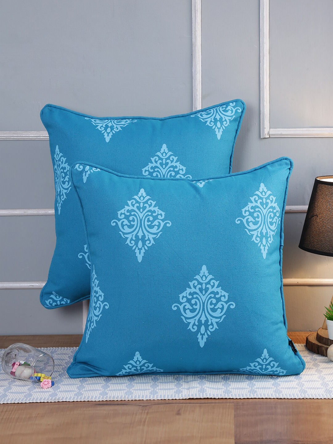 

Soumya 2 Pieces Blue Ethnic Motifs Pure Cotton Square Cushion Covers