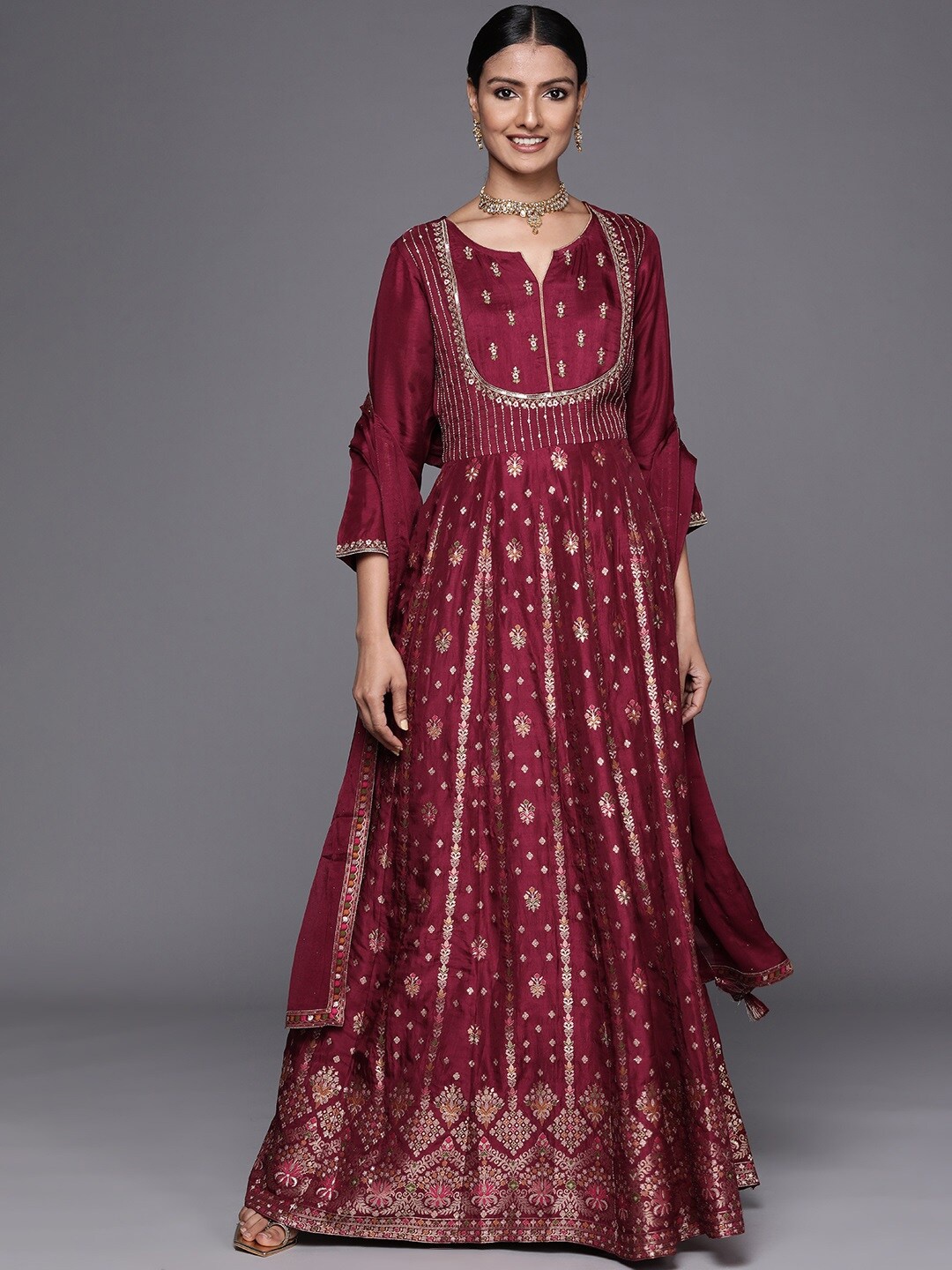 

Libas Maroon & Gold Embroidered Notched Neck Panelled Kurta With Churidar & Dupatta