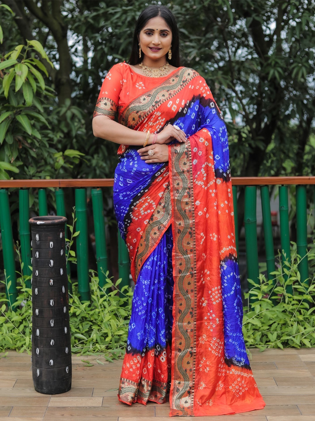 

Mitera Blue & Orange Bandhani Printed Zari Silk Saree