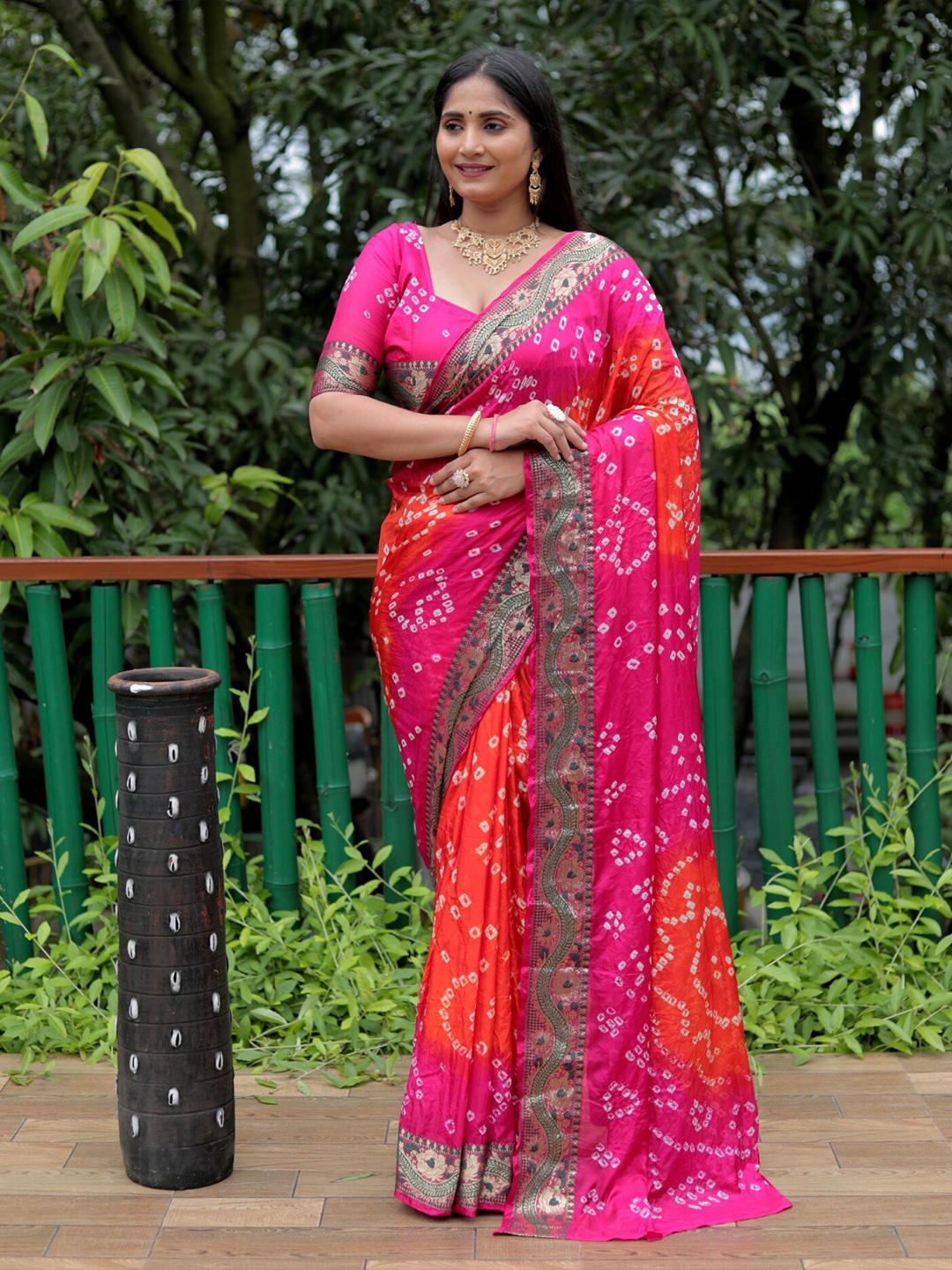 

Mitera Pink & Orange Bandhani Printed Zari Silk Saree