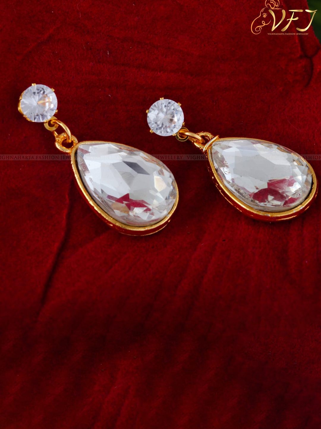 

Vighnaharta Gold-Plated Teardrop Shaped Drop Earrings