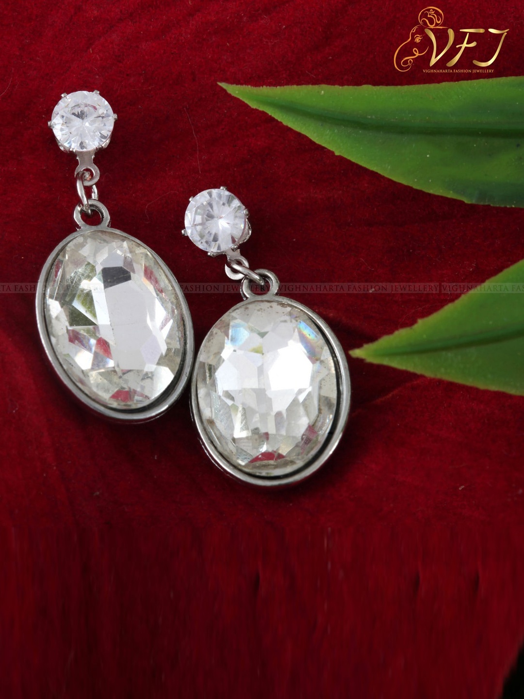 

Vighnaharta Rhodium-Plated Teardrop Shaped Drop Earrings, Silver