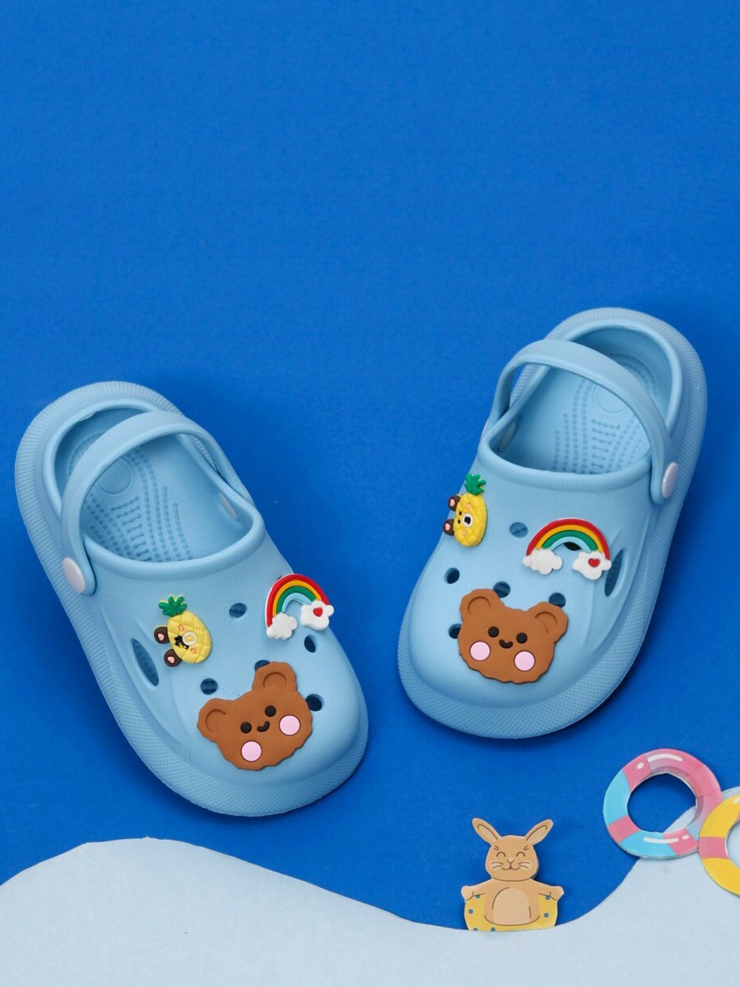 

Yellow Bee Girls Rainbow, Bear and Pineapple Applique Motifs Clogs, Blue