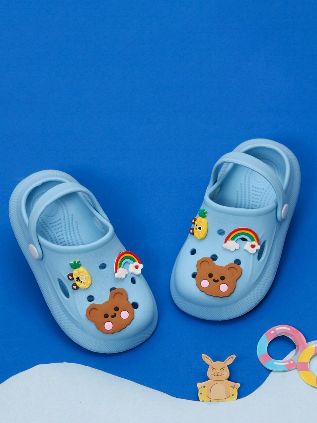 

Yellow Bee Girls Rainbow, Bear and Pineapple Applique Motifs Clogs, Blue