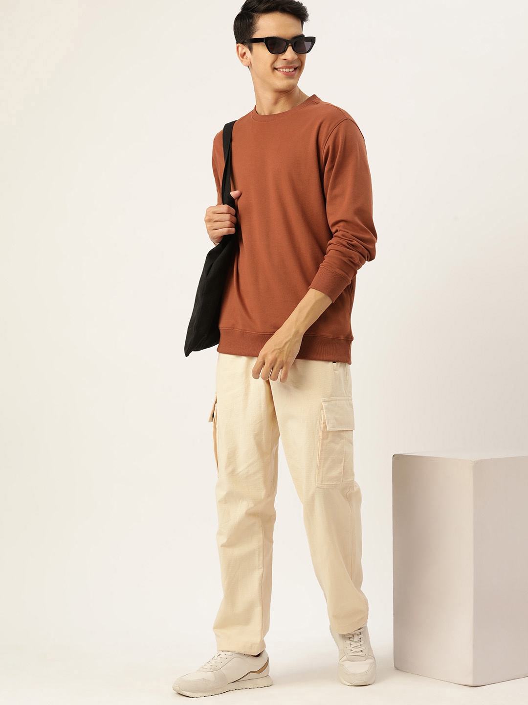 

Mast & Harbour Men Solid Sweatshirt, Brown