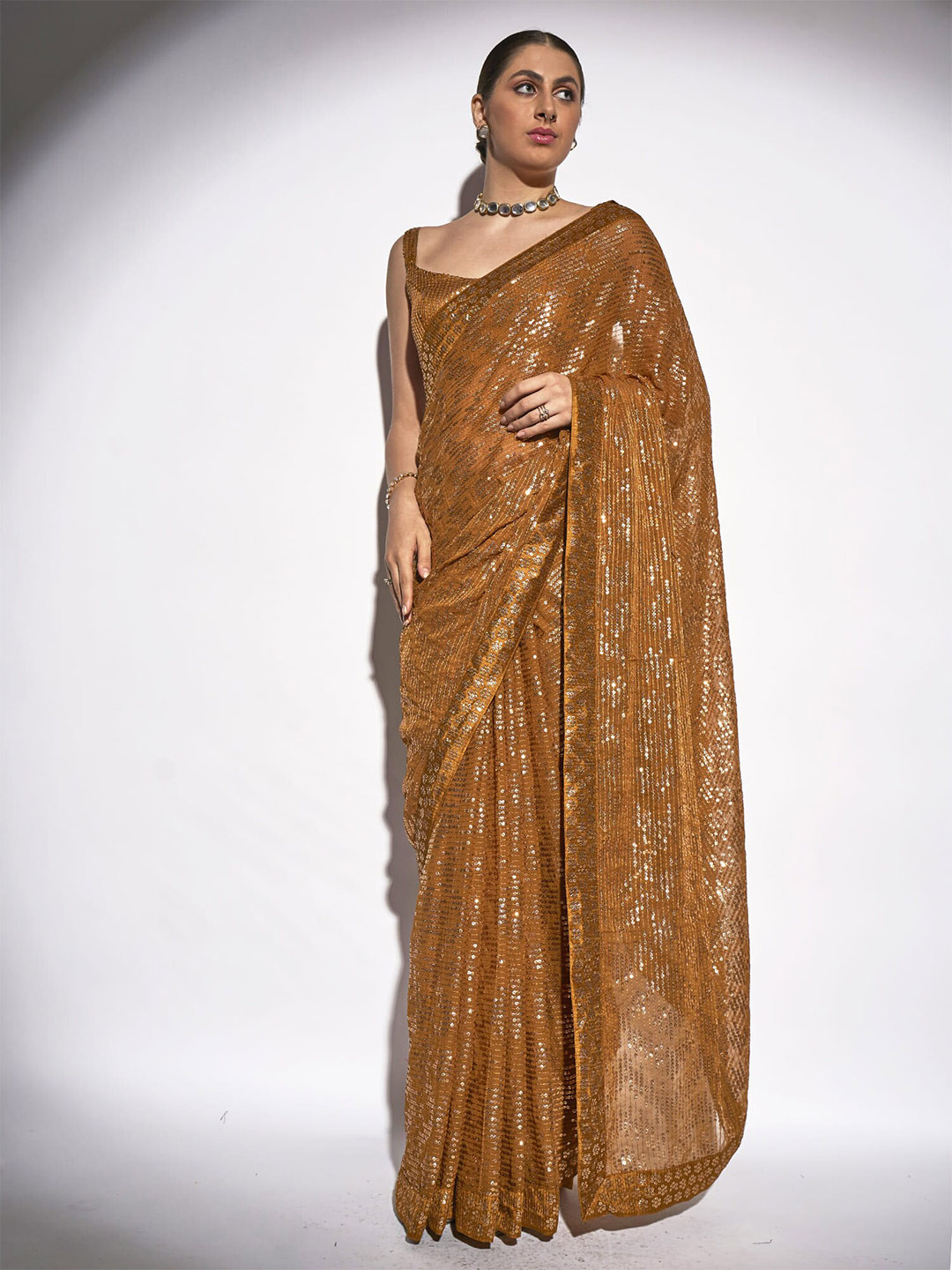 

Kalista Mustard Brown Sequin Embellished Pure Georgette Saree