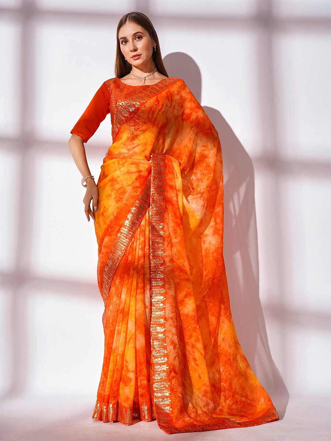 

Kalista Orange & Red Abstract Printed Sequinned Pure Georgette Saree