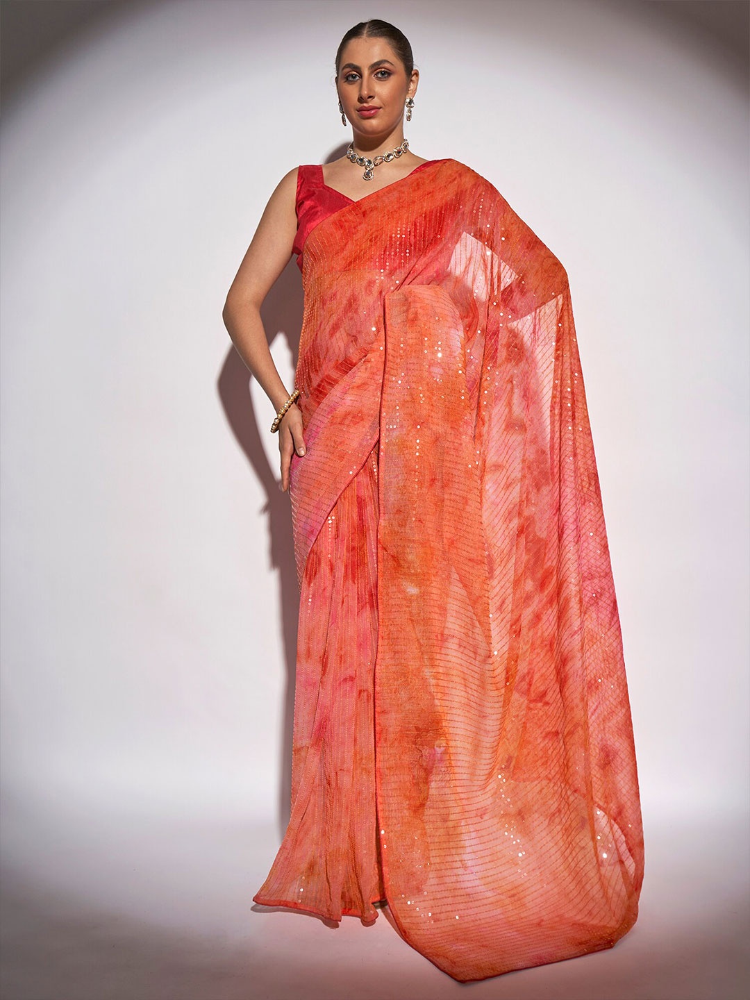 

Kalista Coral & Gold-Toned Embellished Sequinned Pure Georgette Saree