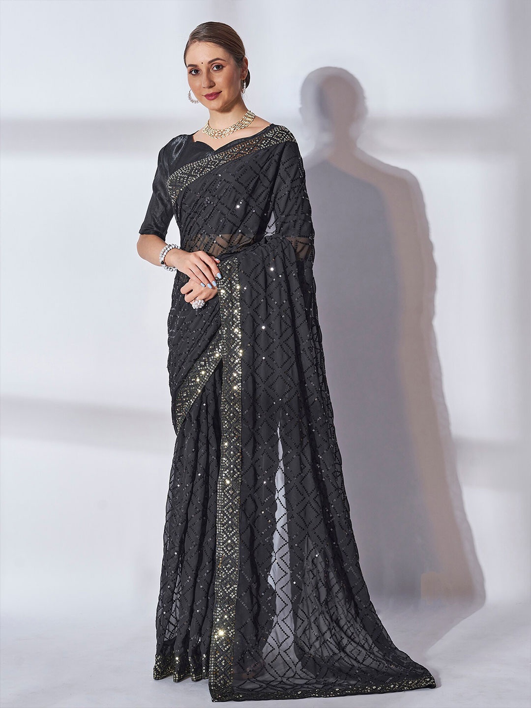 

Kalista Black & Gold-Toned Embellished Sequined Pure Georgette Saree