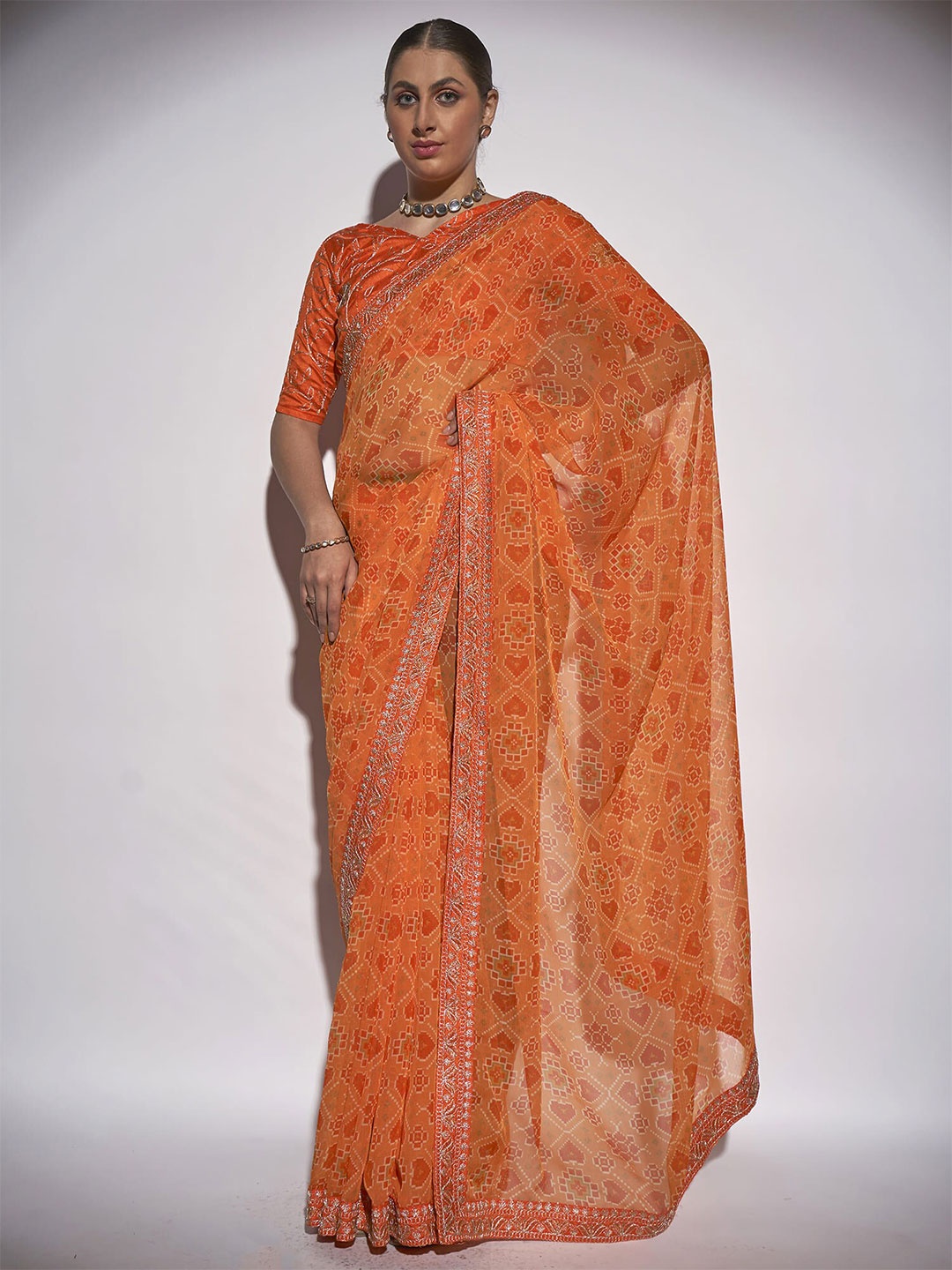 

Kalista Ethnic Motif Printed Embroidered Pure Georgette Saree, Orange
